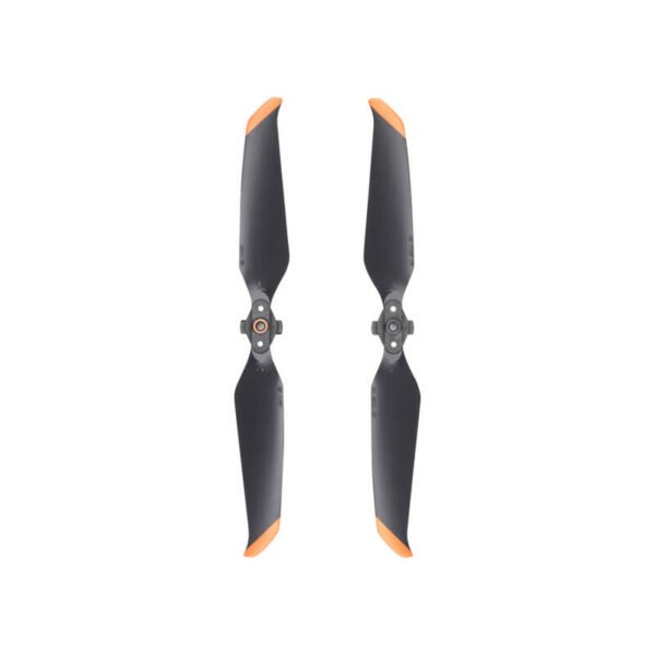 A pair of official DJI Air 2S Low-Noise Propellers resting on a clean background
