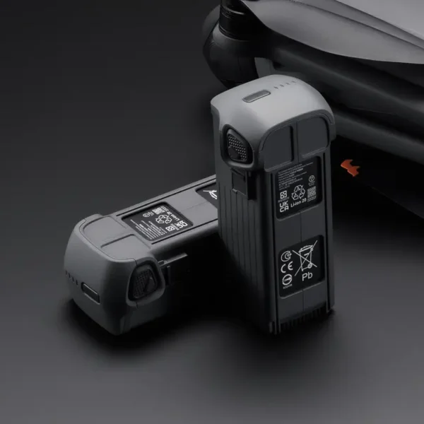 Original DJI Mavic 4 Pro Intelligent Flight Battery isolated on black background